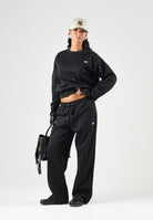 THE NORTH FACE Felpa girocollo SIMPLE DOME CREW nera da donna con logo minimal sul petto. NF0A8HBYJK31 . THE NORTH FACE 