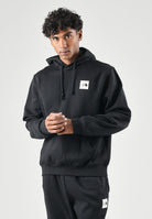 THE NORTH FACE Felpa con cappuccio  tnf black nera per uomo con  tasca a marsupio e patch logo sul petto NF0A8JAXJK31 . THE NORTH FACE 
