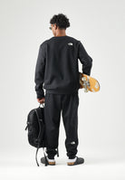THE NORTH FACE Felpa girocollo SIMPLE DOME CREW nero per uomo con  piccolo logo ricamato. NF0A8JAYJK31 . THE NORTH FACE 
