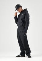 THE NORTH FACE Pantaloni ESSENTIAL SD RELAXED OPEN HEM TNF Black neri da uomo, con vita elasticizzata e gamba ampia.<BR/> NF0A8JBBJK31 . THE NORTH FACE 