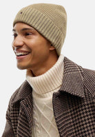 TOMMY HILFIGER Cappello di lana  beige per uomo e donna con lavorazione a coste, bordo risvoltato AM0AM12796 RBC TOMMY HILFIGER 