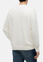 TOMMY HILFIGER Maglione FAG RELAXED, ivory avorio da uomo con motivo bandiera Americana in intarsio sul davanti.<BR/> MW0MW43386 Z00 TOMMY HILFIGER 