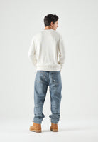 TOMMY HILFIGER Maglione FAG RELAXED, ivory avorio da uomo con motivo bandiera Americana in intarsio sul davanti.<BR/> MW0MW43386 Z00 TOMMY HILFIGER 