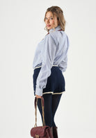 TOMMY HILFIGER Camicia STRIPE SHIRT, regal blue, azzurro e bianco da uomo e donna con motivo a righe verticali sottili.<BR/> MW0MW43746 C7F TOMMY HILFIGER 