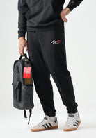 TOMMY JEANS Pantaloni da tuta TJM REGULAR nero da uomo con logo firma a contrasto.<BR/> DM0DM23903 BDS TOMMY JEANS 