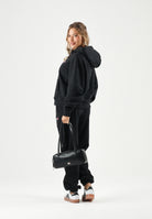 TOMMY JEANS Felpa con cappuccio nera da donna rifinita da logo DW0DW19414 BDS TOMMY JEANS 