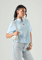 TOMMY JEANS t-shirt Tommy Badge Boxy Crew Neck T-Shirt celeste azzurro da  donna. DW0DW22202 C1R TOMMY JEANS 