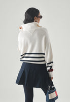 TOMMY JEANS maglione Tommy Badge Stripe Quarter-Zip Jumper Ancient White Stripe bianco/panna donna. DW0DW22928 YBH TOMMY JEANS 