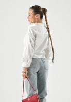 TOMMY JEANS camicia cropped TJW Rlx Crop Shirt Ecru bianco donna. DW0DW22943 YBL TOMMY JEANS 