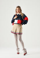 TOMMY JEANS minigonna pieghettata Global Stripe Tape Pleated Mini Skirt  Gentle Gold beige da donna. DW0DW22969 AB9 TOMMY JEANS 
