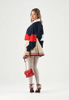 TOMMY JEANS minigonna pieghettata Global Stripe Tape Pleated Mini Skirt  Gentle Gold beige da donna. DW0DW22969 AB9 TOMMY JEANS 