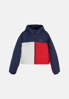 TOMMY JEANS Piumino FLAG COLOUR-BLOCKED Dark Blue blu navy scuro da donna, con inserti bianchi e rossi, cappuccio e fondo regolabile con coulisse. DW0DW23414 C1G TOMMY JEANS 