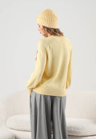 TOMMY JEANS Maglione girocollo FLAG CREW NECK JUMPER giallo crema da donna DW0DW23450 ZF9 TOMMY JEANS 