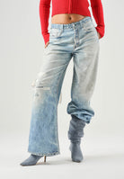 TOMMY JEANS Jeans denim celeste da donna con dettagli distressed e lavaggio denim effetto vissuto.<BR/> DW0DW23466 1A5 TOMMY JEANS 