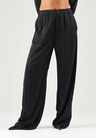 TWENTY FOURHAITCH Pantaloni palazzo neri da donna con vita elasticizzata e tessuto fluido A200NER 62A . TWENTY FOURHAITCH 