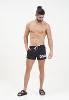DSQUARED2 Shorts mare nera da uomo con logo all-over D7B5C5950 010 DSQUARED2 