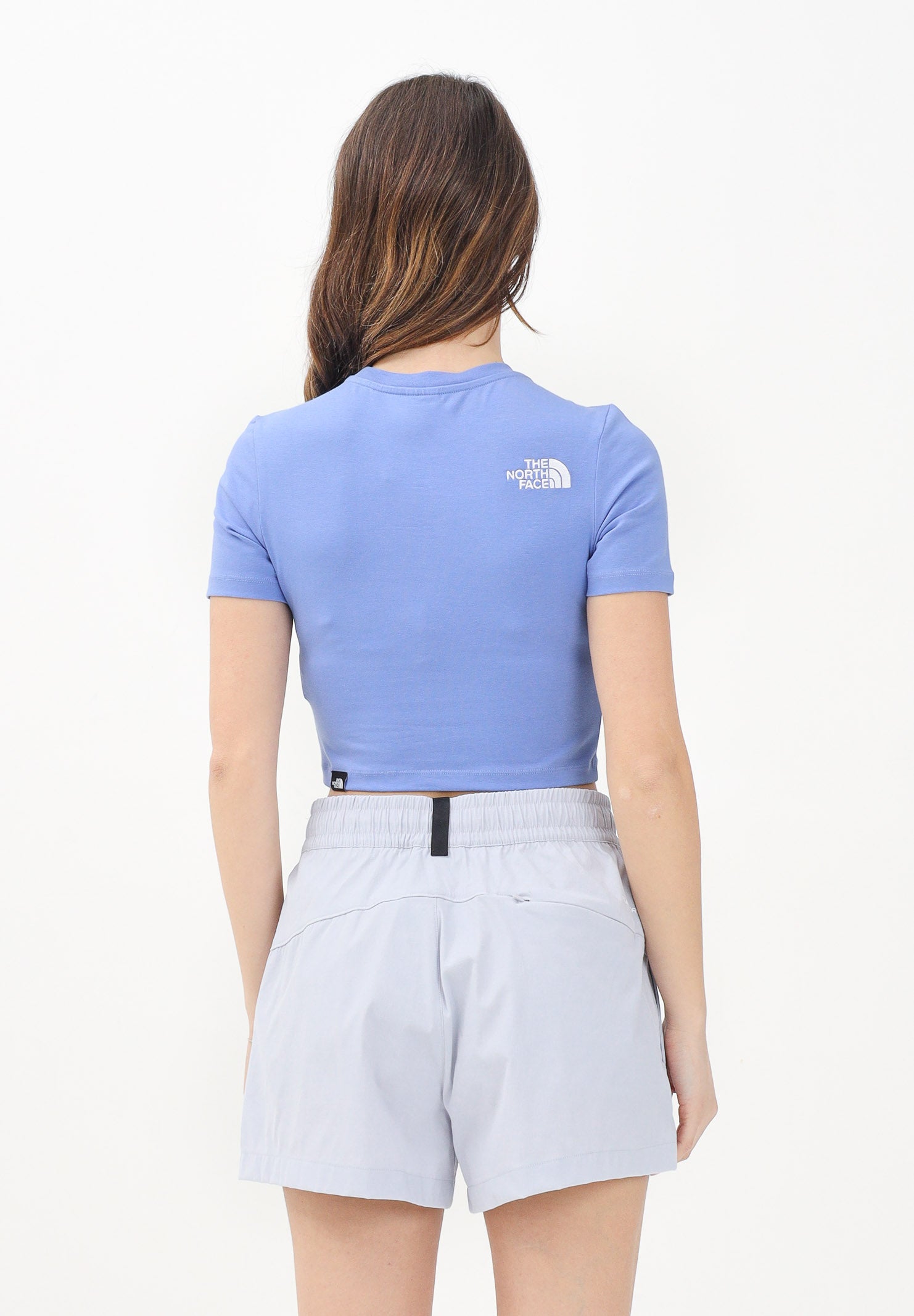 THE NORTH FACE T-shirt crop a manica corta viola da donna con logo NF0A55AO0YI1 . THE NORTH FACE 