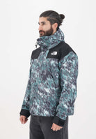 THE NORTH FACE Giacca a vento DryVent™ Mono Mountain da uomo con fantasia verde e nera NF0A88XF87A1 . THE NORTH FACE 