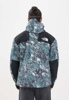 THE NORTH FACE Giacca a vento DryVent™ Mono Mountain da uomo con fantasia verde e nera NF0A88XF87A1 . THE NORTH FACE 