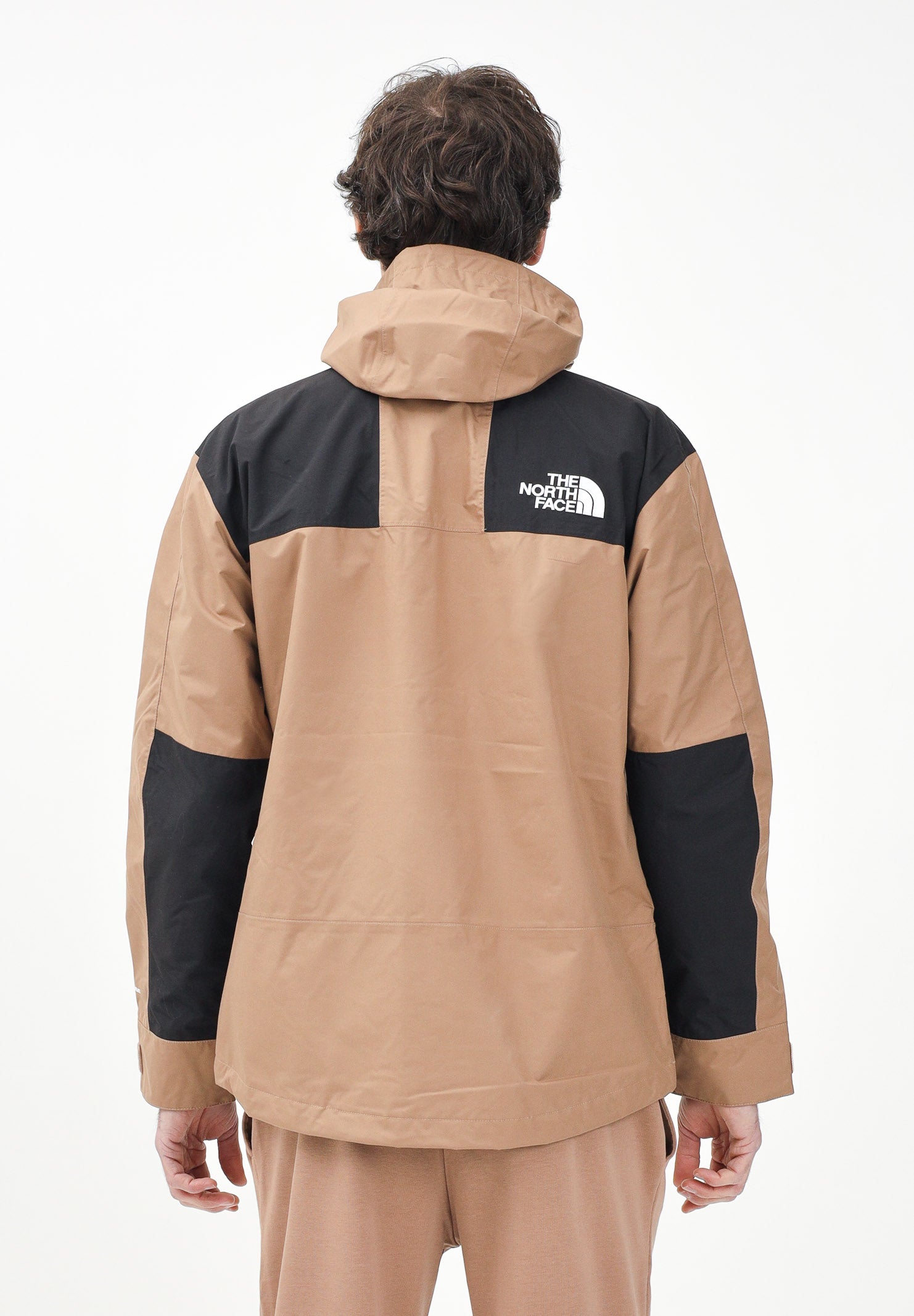 THE NORTH FACE Giacca a vento Reign On marrone e nera da uomo NF0A8B5G58W1 . THE NORTH FACE 