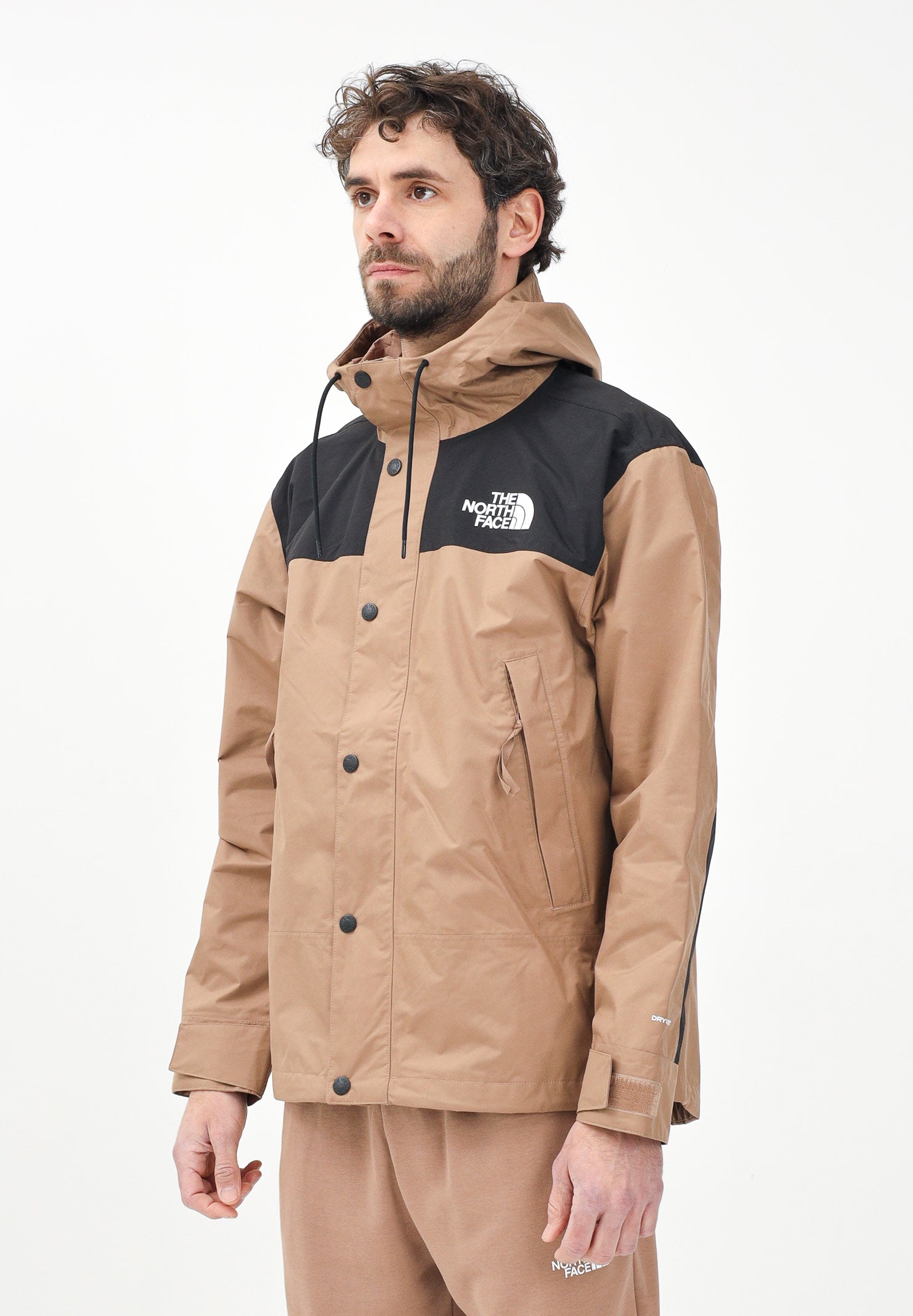 THE NORTH FACE Giacca a vento Reign On marrone e nera da uomo NF0A8B5G58W1 . THE NORTH FACE 