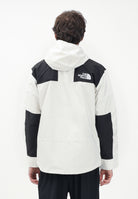 THE NORTH FACE Giacca a vento Reign On bianca e nera da uomo NF0A8B5GROU1 . THE NORTH FACE 