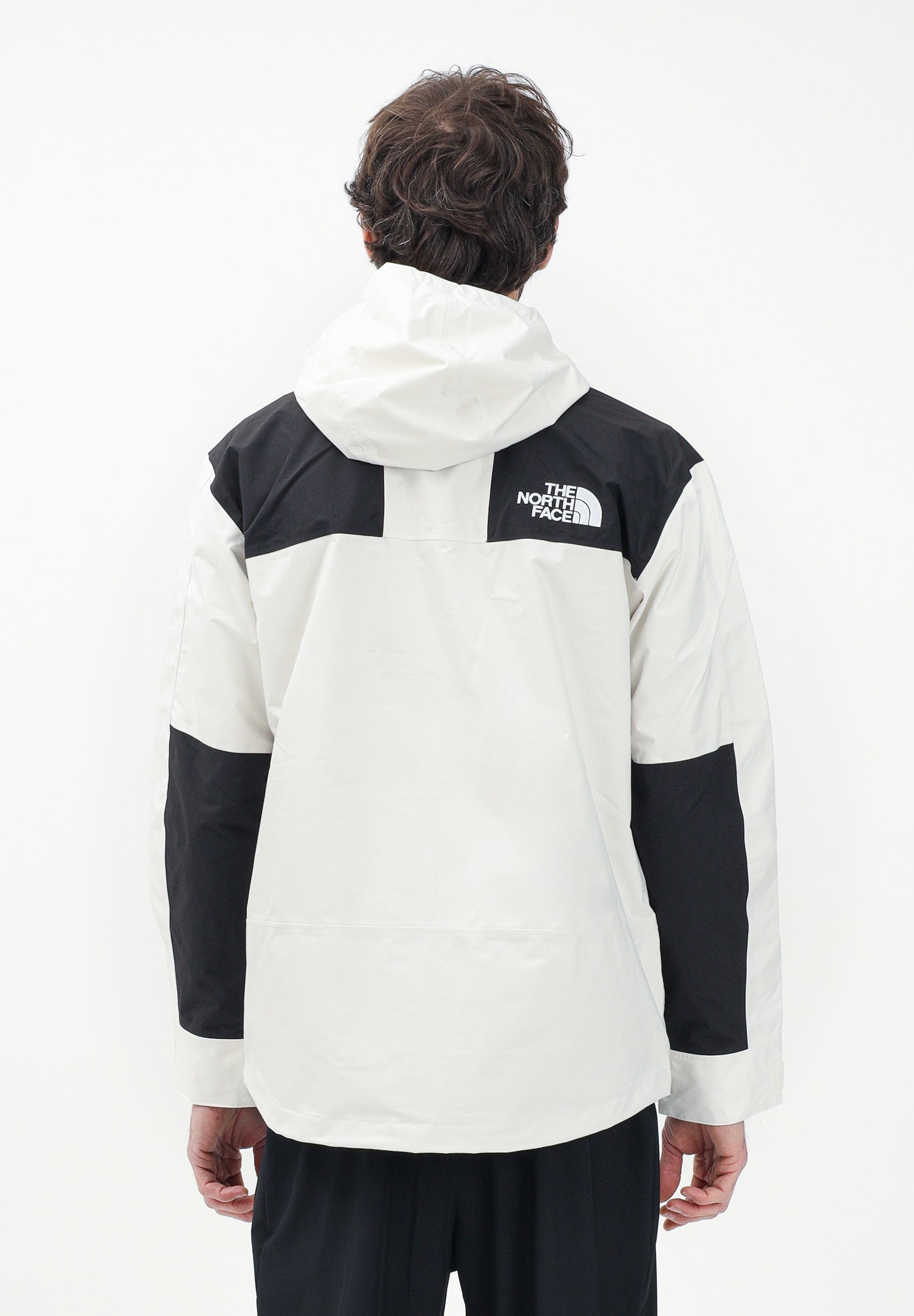 THE NORTH FACE Giacca a vento Reign On bianca e nera da uomo NF0A8B5GROU1 . THE NORTH FACE 