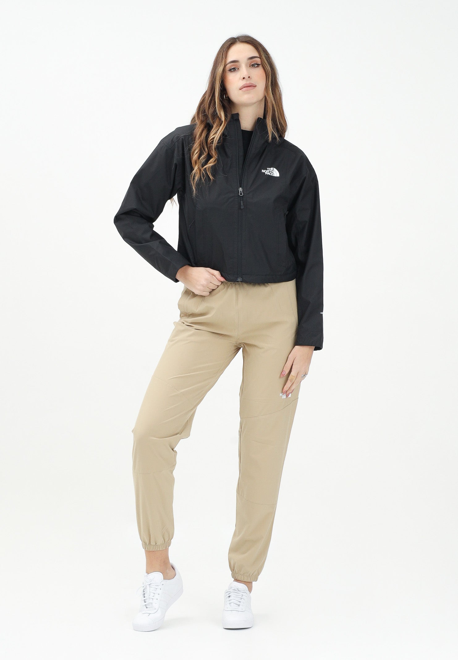 THE NORTH FACE Pantalone antivento Mountain Athletics beige da donna NF0A8BGPLK51 . THE NORTH FACE 