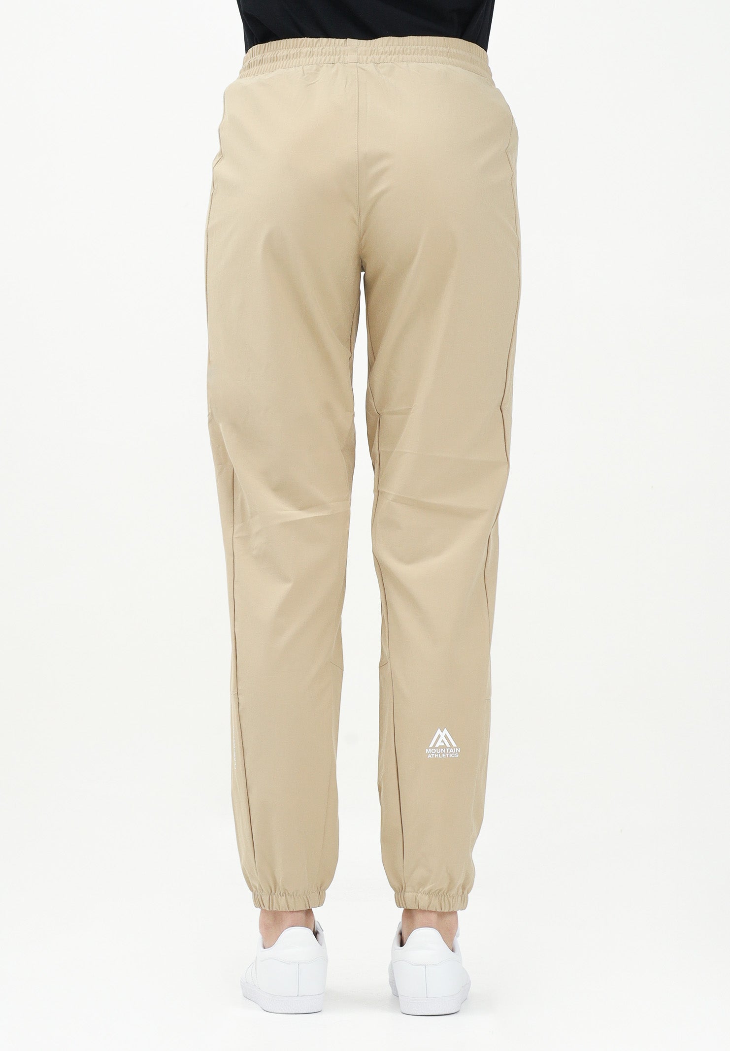 THE NORTH FACE Pantalone antivento Mountain Athletics beige da donna NF0A8BGPLK51 . THE NORTH FACE 