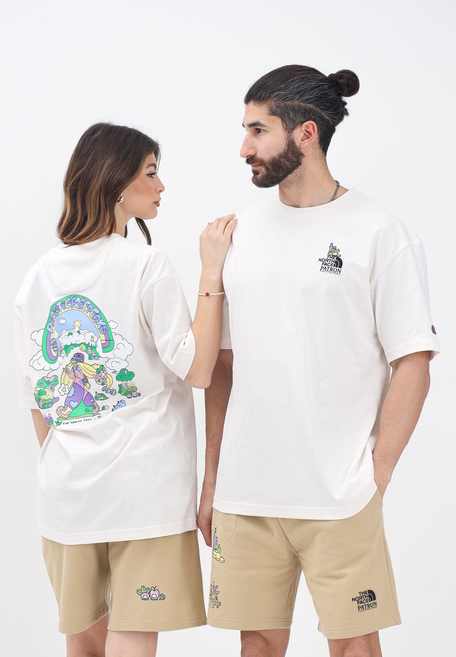 THE NORTH FACE T-shirt a manica corta Clean Trails Oversized panna per uomo e donna NF0A8C2TQLI1 . THE NORTH FACE 