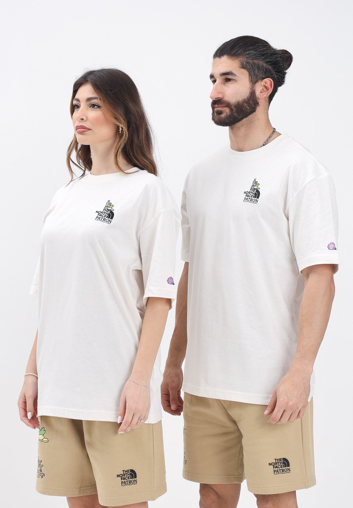 THE NORTH FACE T-shirt a manica corta Clean Trails Oversized panna per uomo e donna NF0A8C2TQLI1 . THE NORTH FACE 