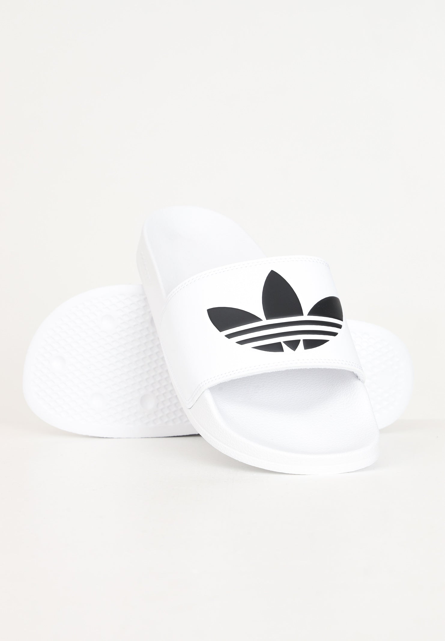 Ciabatte Adilette lite bianche per uomo e donna FU8297 . ADIDAS ORIGINALS 