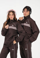 ADIDAS ORIGINALS Giacca a vento CHEST STRIPES marrone e rosa per uomo e donna KC6436 . ADIDAS ORIGINALS 