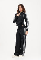 ADIDAS ORIGINALS Pantalone sportivo Smocked Firebird nero da donna KD0301 . ADIDAS ORIGINALS 