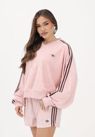 ADIDAS ORIGINALS Polo in spugna a manica lunga rosa da donna KD1400 . ADIDAS ORIGINALS 