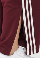 ADIDAS ORIGINALS Pantalone sportivo FIREBIRD LOOSE bordeaux da donna KD3659 . ADIDAS ORIGINALS 