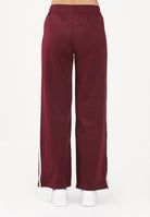 ADIDAS ORIGINALS Pantalone sportivo FIREBIRD LOOSE bordeaux da donna KD3659 . ADIDAS ORIGINALS 