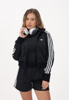 ADIDAS ORIGINALS Felpa con zip Firebird nera da donna con dettagli in maglia all'uncinetto KD5455 . ADIDAS ORIGINALS 