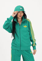 ADIDAS ORIGINALS Felpa con zip Firebird Loose verde da donna KD7987 . ADIDAS ORIGINALS 