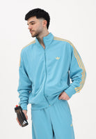 ADIDAS ORIGINALS Felpa con zip Firebird azzurra da uomo KE1642 . ADIDAS ORIGINALS 