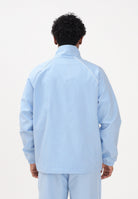 ADIDAS ORIGINALS Giacca a vento CHEST STRIPES celeste da uomo KE2164 . ADIDAS ORIGINALS 