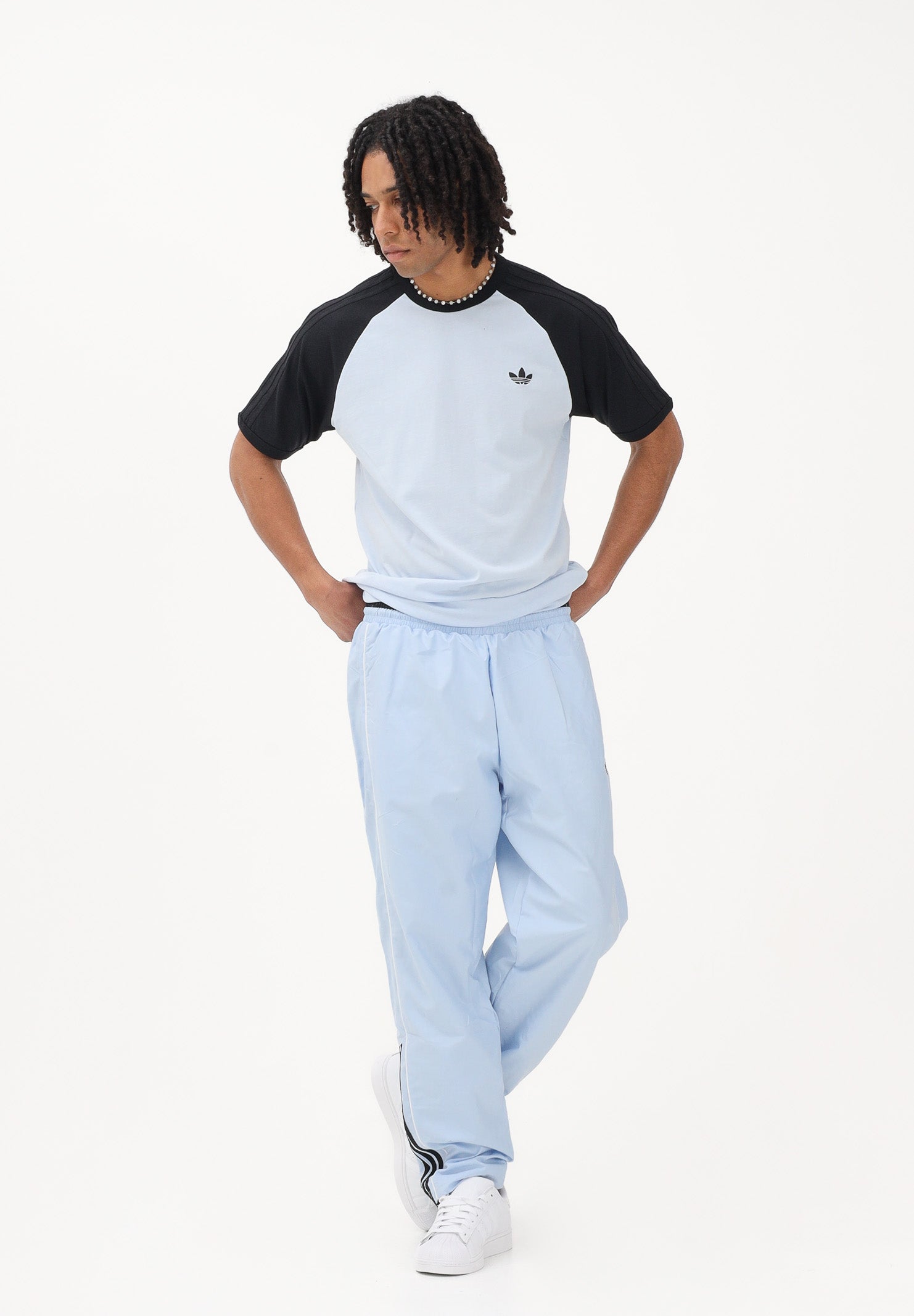 ADIDAS ORIGINALS Pantalone sportivo HALF STRIPES celeste da uomo KE2165 . ADIDAS ORIGINALS 