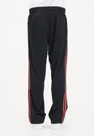 ADIDAS ORIGINALS Pantalone sportivo Firebird nero e rosso da uomo KE3457 . ADIDAS ORIGINALS 