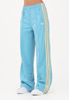 ADIDAS ORIGINALS Pantalone sportivo FIREBIRD azzurro e giallo da donna KT4628 . ADIDAS ORIGINALS 