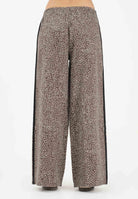 ADIDAS ORIGINALS Pantalone sportivo Firebird Oversized AOP in denim animalier da donna KD8811 . ADIDAS ORIGINALS 
