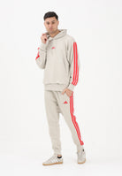 ADIDAS PERFORMANCE Pantalone sportivo Ess 3-Stripes French Terry beige e rosso da uomo KD4898 . ADIDAS PERFORMANCE 