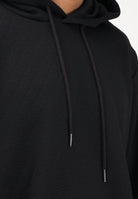 ARMANI EXCHANGE Felpa con cappuccio nera da uomo con texture jacquard XM002344AF21862 UC001 ARMANI EXCHANGE 