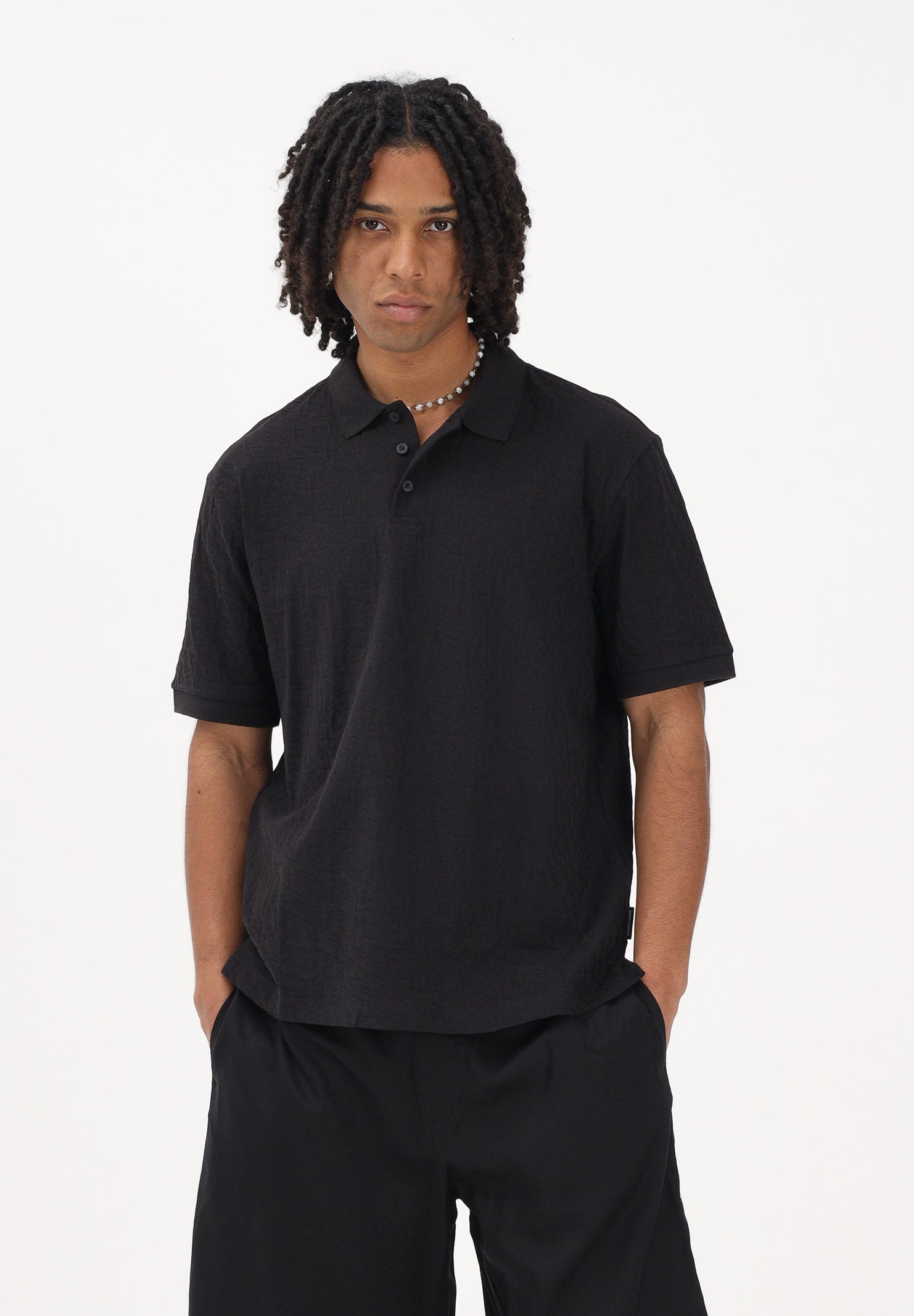 ARMANI EXCHANGE Polo a manica corta nera da uomo con logo all-over XM002346AF10337 UC001 ARMANI EXCHANGE 