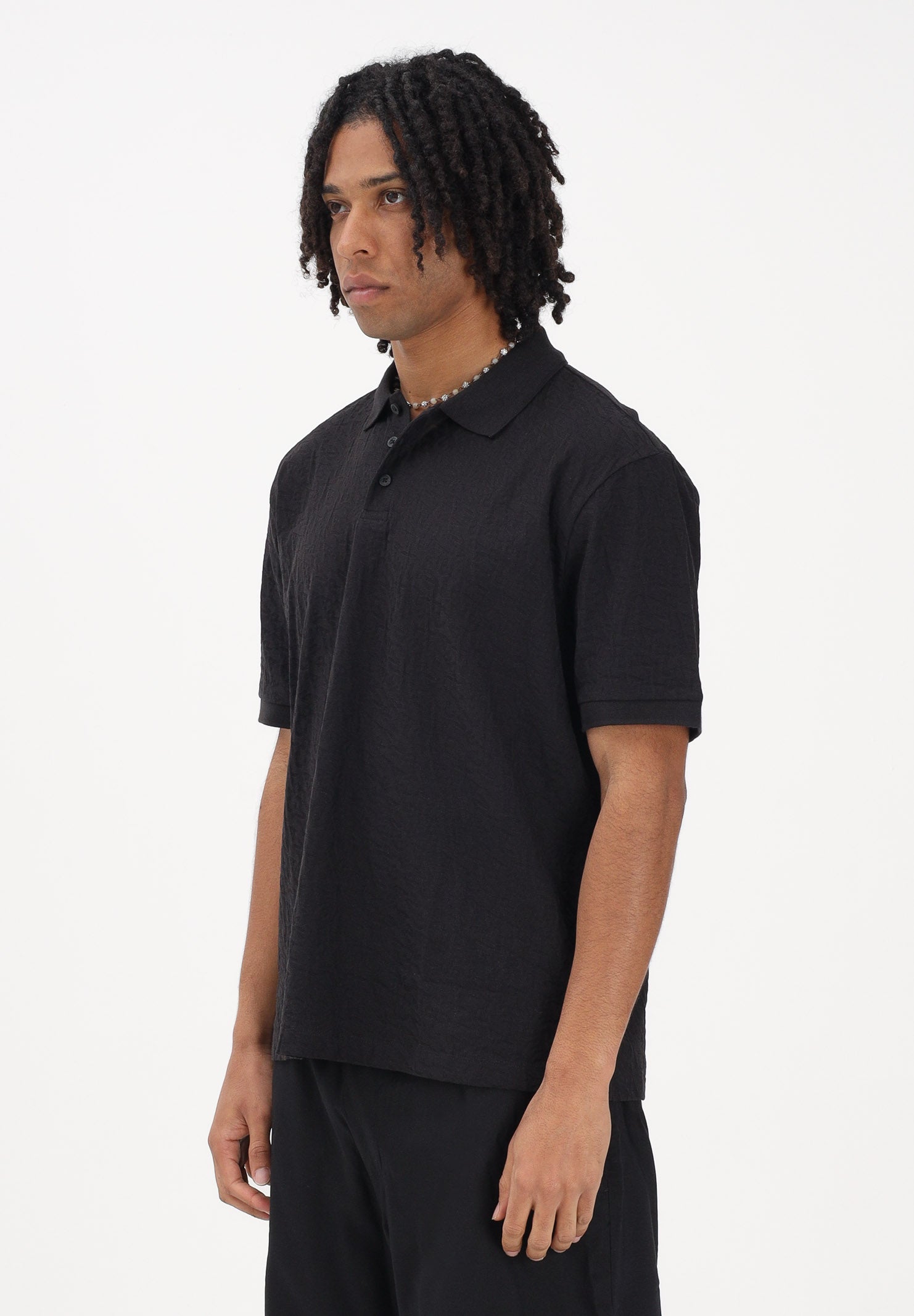 ARMANI EXCHANGE Polo a manica corta nera da uomo con logo all-over XM002346AF10337 UC001 ARMANI EXCHANGE 