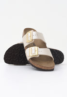 BIRKENSTOCK Ciabatte Sydney Cushion Buckle bianche da donna 1029492 . BIRKENSTOCK 